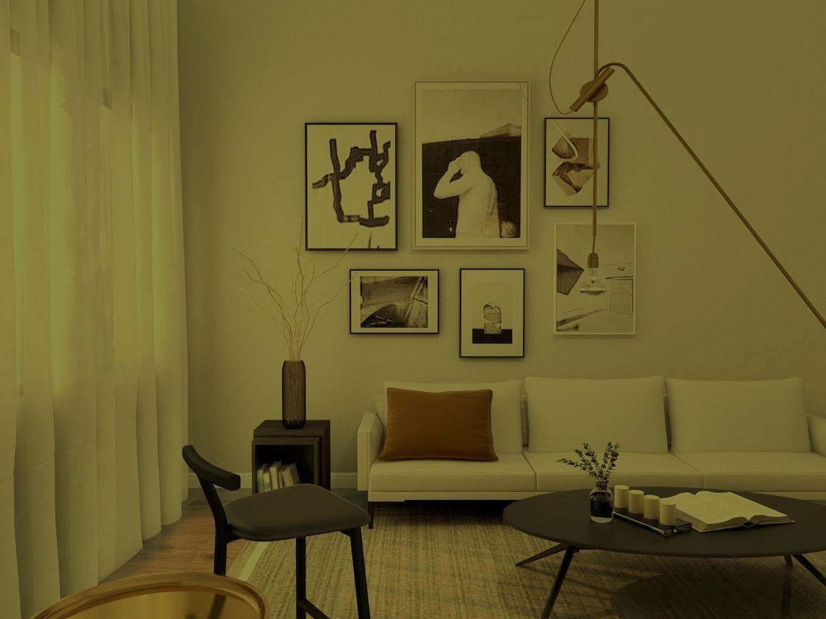 Dark interior room with heavy shadows and warm color cast