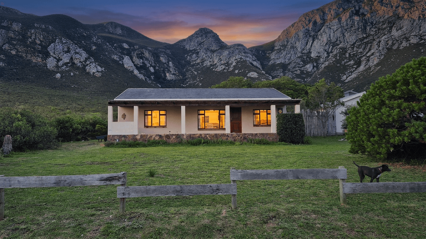 The same home converted to a warm dusk scene